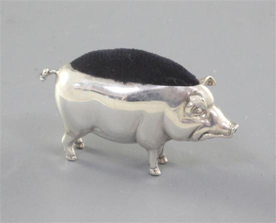 An Edwardian silver novelty pig pin cushion, by Adie & Lovekin Ltd, length 49mm.